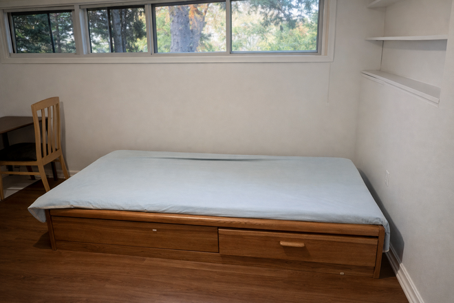 Bedroom A: $950 Private room with Single Sized Bed - (Ideal For Vegetarian) Private room for rent in a shared basement at Barford Road House