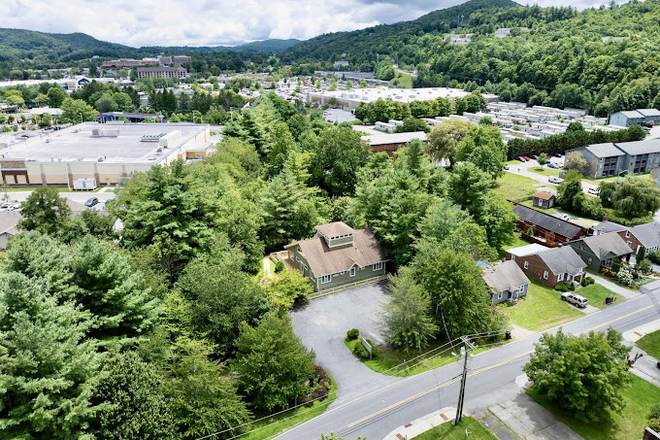 Aerial View of the Property, also showcasing neighboring commerce - Looking for male sublet for unit ft. 2 male roomates/The View Apartments
