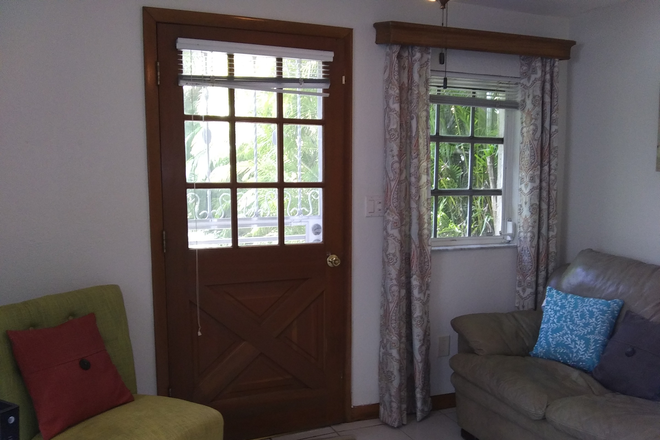 Outside View from Living Room - Private Quiet Cozy Cottage in a Great Location, All Included! Apartments