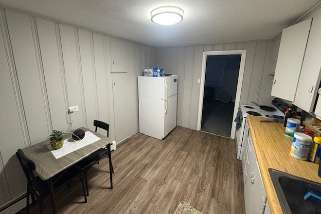 Kitchen/Entrence - Maplewood Apartments