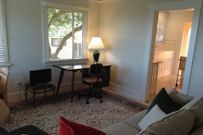 Living Room with desk & TV - Fabulous Bay View, Totally Furnished Apt., 10 min. walk to North campus entrance.