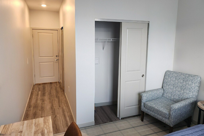 Photo of Bedroom, with closet and hall visible - 320 West Mag Apartment 615 Lease Takeover for Spring and Summer Semesters(Jan-July)