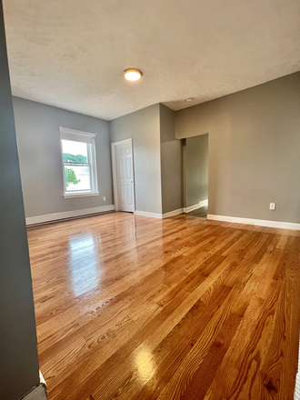 living room - 4 bed 1 bath. Renovated Apartments