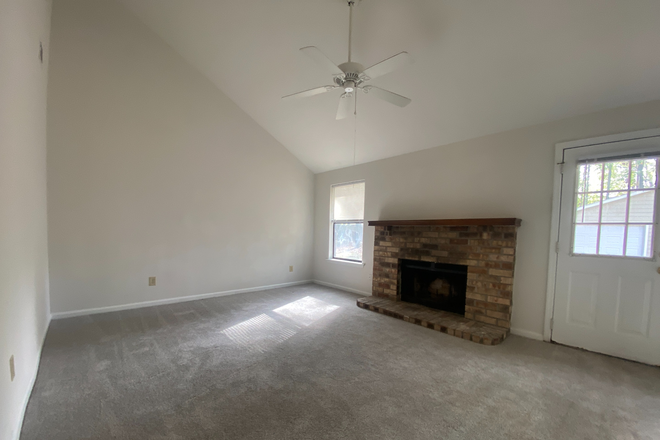 Living Room with Fireplace - Knollwood Duplexes