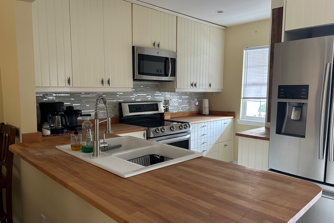 Ikea kitchen. And man do I miss it. - Clean with lots of New New. Furnished 2 bdrm, 1075 sq ft. Townhome