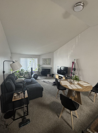 living room (balcony off to left) - Chase Village Apartments