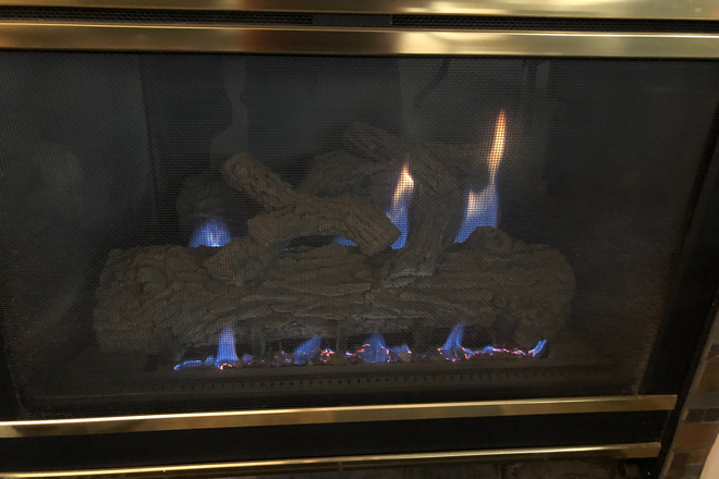 Fireplace in the living area - 3095 29th Street/Winds 11 Condo's.  Fully furnished executive style condo