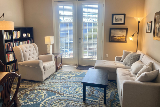 Living room with french doors to terrace - Condo w/Terrace, 12-Min Walk to UVA Hospital