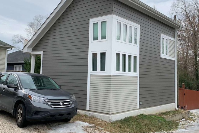 back of house and parking space - Fully Furnished Guest House Walking Distance to East Campus