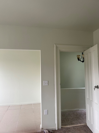 Bedroom door leading to bathroom and stairs - 2 Family house with top triplex available for rent