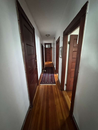 View of hallway from bedroom - Bedroom for rent in 3-bed, 1-bath, 2nd-floor apartment in Brookline