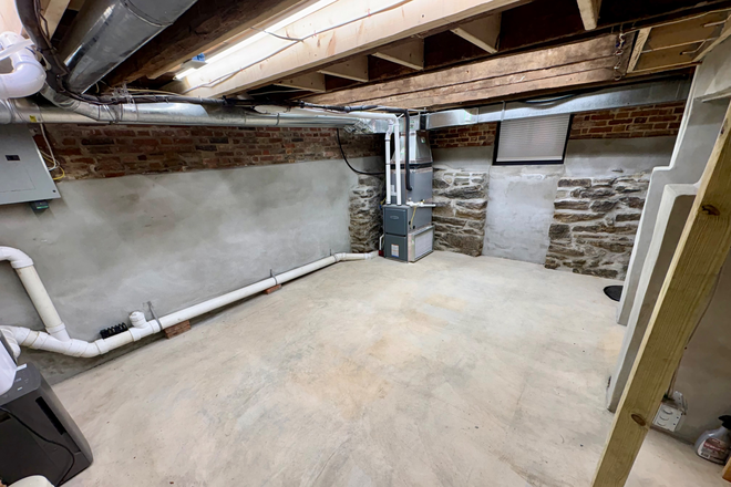 Basement - Charming Historic Row Home in the Heart of Fells Point *with parking pad*