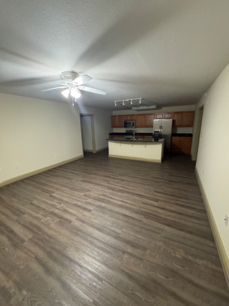 Living Room/Kitchen Area - The Flats at the Pier - 1711 Muscovy Way Condo