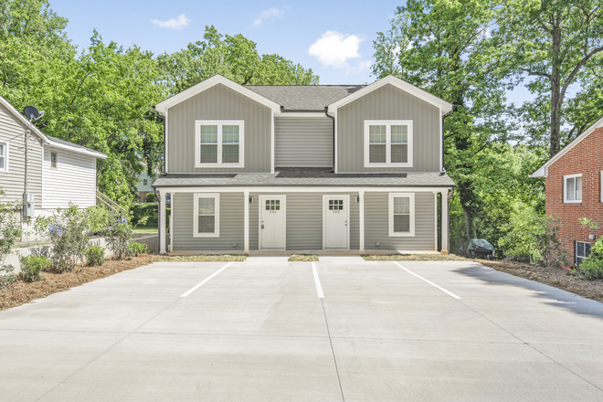 Admire the charming front view of this home, featuring a welcoming covered porch perfect for relaxation and socializing. The exterior is com - Town House Downtown/Brookstown/Vine