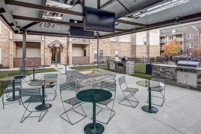 Amenities outside - Lodges of East Lansing Apartments