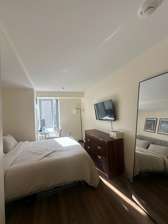 Bedroom - Furnished room for rent in One Western Ave Apartments
