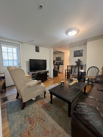 living room - Spacious 3 Bed / 2 Bath near campus! Large Backyard! Pet friendly! Available 9/1/25!