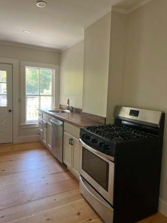 kitchen, exit door to back porch - Large Two Bedroom Apartment Woodstock Village VT
