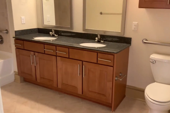 bathroom 1 sinks - Trinity Commons Apartments