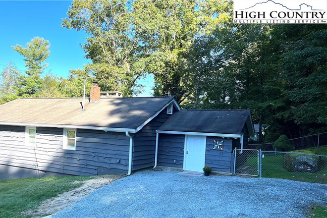 Driveway and entrance door into den area - Bedroom Available in 3 BR 1 1/2 BA After December 15th House