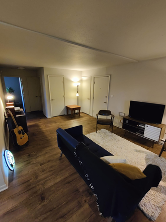 Living Room - University Crossing - Happy Hollow Apartments