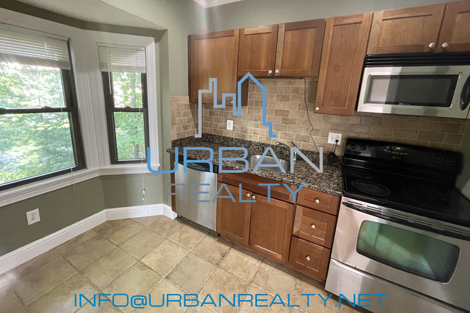 KITCHEN - RENOVATED 2 BED 1 BATH DIRECTLY ACROSS THE STREET FROM BC CAMPUS AVAILABLE AUG 1ST Apartments