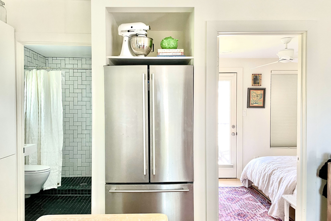 View into bedroom - Sunny, Fully Furnished 1-Bedroom Garage Apartment