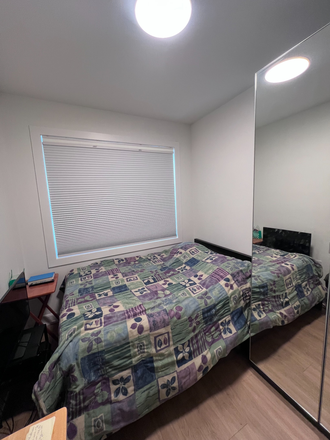 Bedroom #1 - Newly Renovated Rooms in One of Toronto's Best Locations! Bloor & Bathurst from $1,000/month—Book Apartments