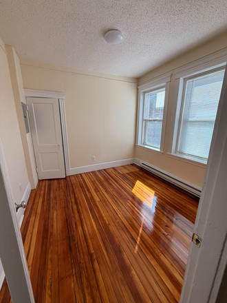 Visit hubrealtyproperties.com - Top floor roomy 2 bedroom with brand new kitchen and bathroom, new hardwood floors Apartments