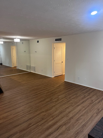 Living Area - Easy Access to Everything - Quiet Condo Community 2 Bed/1 Bath includes Cable, Water & Washer/Dryer
