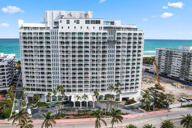 Building Front - Stunning Fully Furnished 3/2 Condo with Direct Ocean Views, Massive Balcony and Two Parking Spaces!