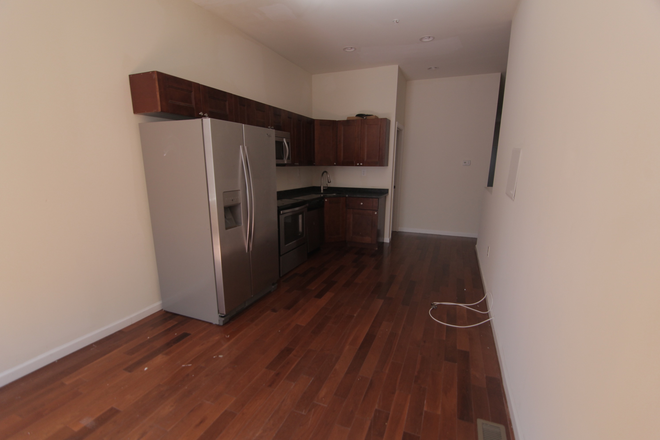 Living room - OCP - Spacious 3 Bed 3.5 Bath Unit With Private Patio Apartments