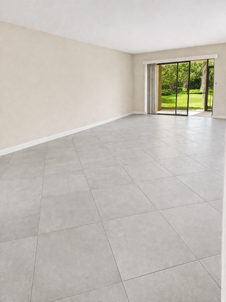 living room and patio to garden and lake - Room in Windwood in 3/2 (1st floor Lakeview) Condo