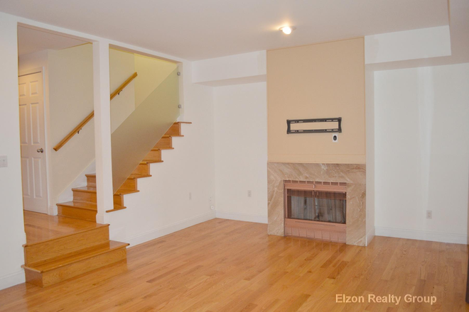 living room - Updated 5/13/24 Awesome 4 bed townhouse on Undine, Modern, Washer/dryer, Big living room, 2025!