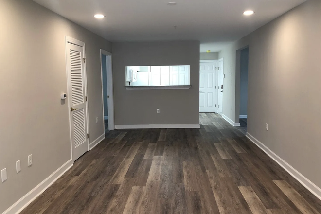 Living/ Dining - Room with Private Bath at Partners Place Condo