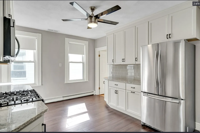 Kitchen - Looking for roommates to fill a sunny top-floor condo