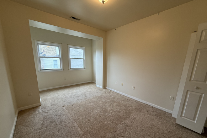 Bedroom - Spacious Apartment in Vibrant Reservoir Hill