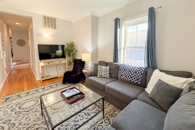 Living Room, Flat-Screen TV - STARS 7 Harvard Furnished Apartment