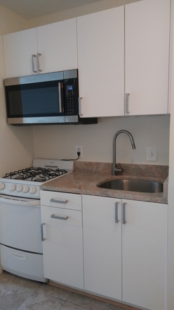 Kitchen - Comfortable studio close to public transportation, shopping, restaurants and parks Condo