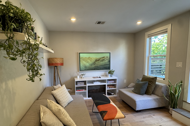 Lounge with fire place, 55" TV, etc. - Fully furnished and equipped condo close to campus with large private deck available July/August