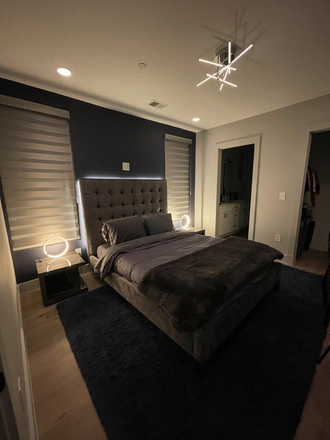 The spacious primary suite is a peaceful retreat featuring a plush king-size bed, premium linens, generous closet space, and abundant natura - The Arietta at Park View Headline: Modern 2BR Executive Residence with Reserved Parki Condo