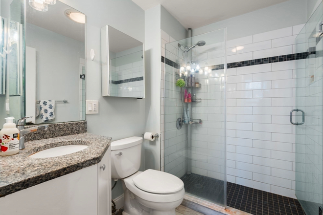 Bathroom - Sun-filled top, corner unit with private roof top deck in Symphony Area Condo