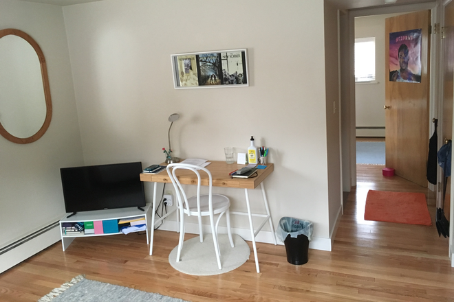 Living Room with desk. Note: Real red oak hardwood floors. - Downtown Ann Arbor, Private Cul-de-Sac, Small Private Building, Mature Tenants, Lots of Parking Apartments