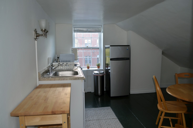 Kitchen - Spacious 2 BR/2BA, furnished. Across the street from campus $2750/mo Heat/AC & Utils Included Apartments