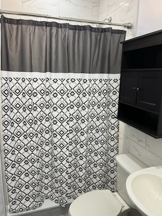 2 of 2 bathrooms - Alumni House Men's Residence