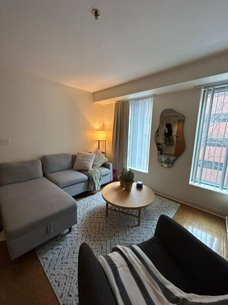 Cozy living room with TV set - Fully furnished 2B/2BA on HBS Campus Apartments