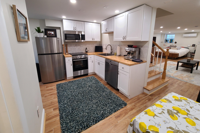 Eat-in kitchen (with dishwasher) - Large Leafy and Luxurious Chevy Chase DC Studio Rental Apartments