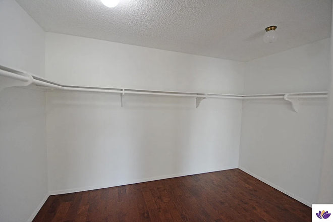 Walk-in Closet - Master Bedroom - Casa California Apartments, Close to South Campus, Fillmore Station, and Trader Joe's