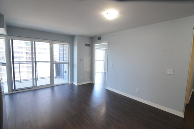 Living Room and Balcony - Large 2 Bedroom Plus Den Condo In Scarborough, near UOT and SHN Hospitals