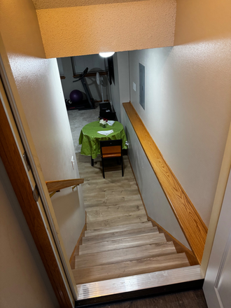 downstairs to the unit - 1 Cozy spacious Lower Level unit in a residential home on a cud-de-sac street